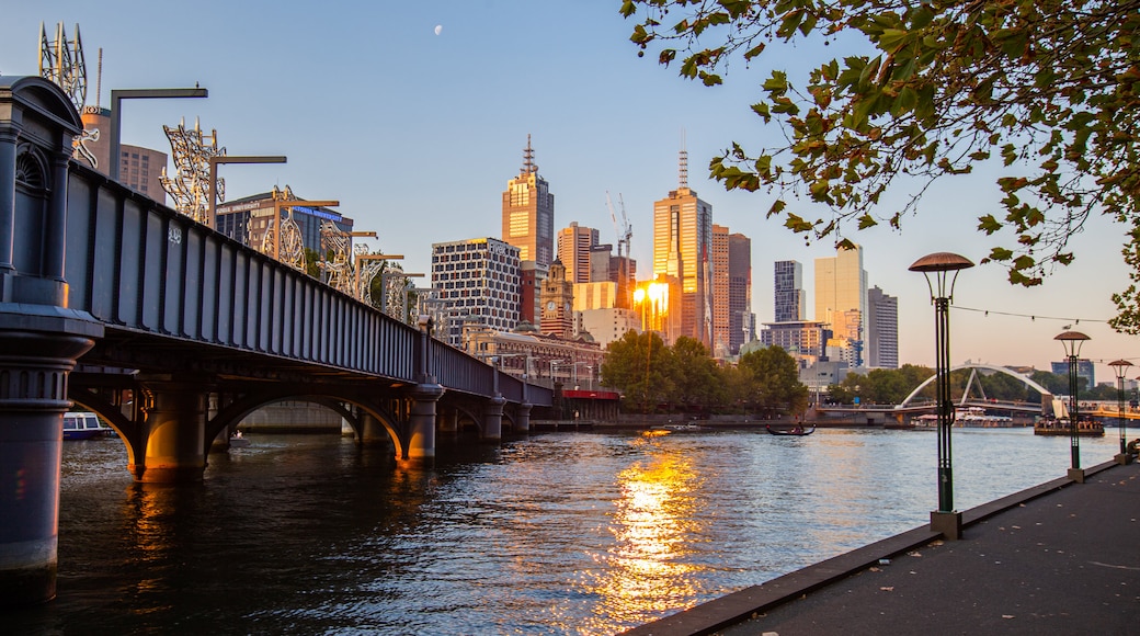 Southbank Promenade showing a river or creek, a city and a bridge