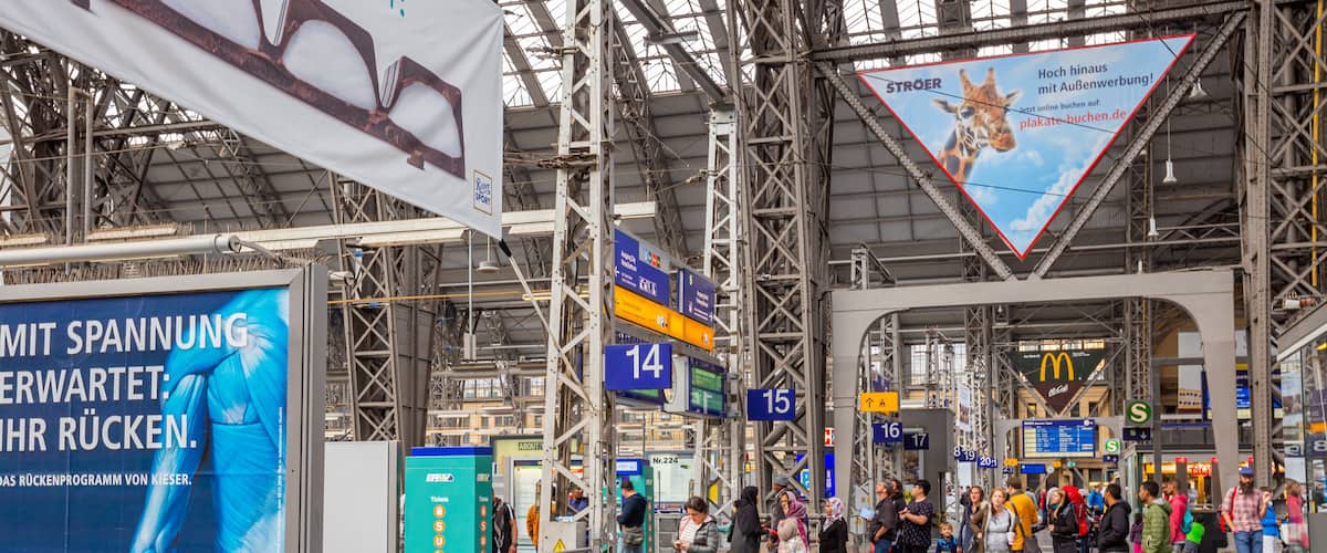 Bahnhofsviertel featuring interior views as well as a large group of people