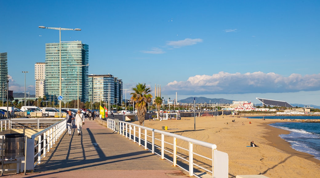 Mar Bella Beach showing a coastal town and a beach