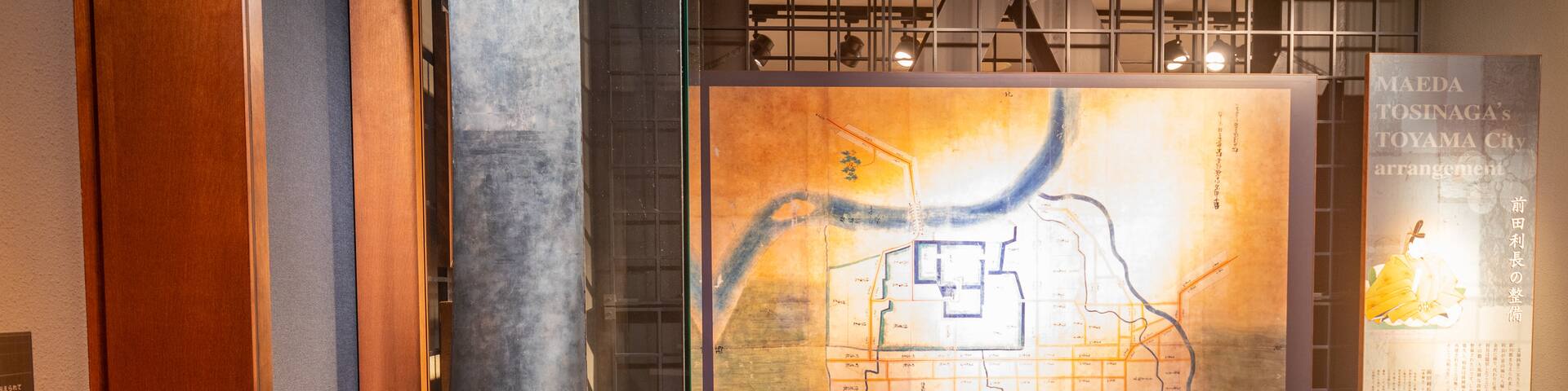 Toyama Castle featuring interior views and signage