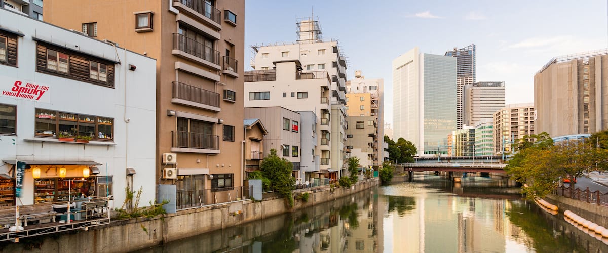 Kannai featuring a city, a river or creek and a sunset