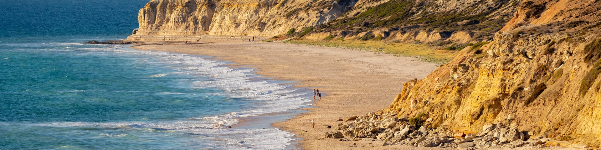 Port Willunga Beach featuring general coastal views, rugged coastline and a sandy beach