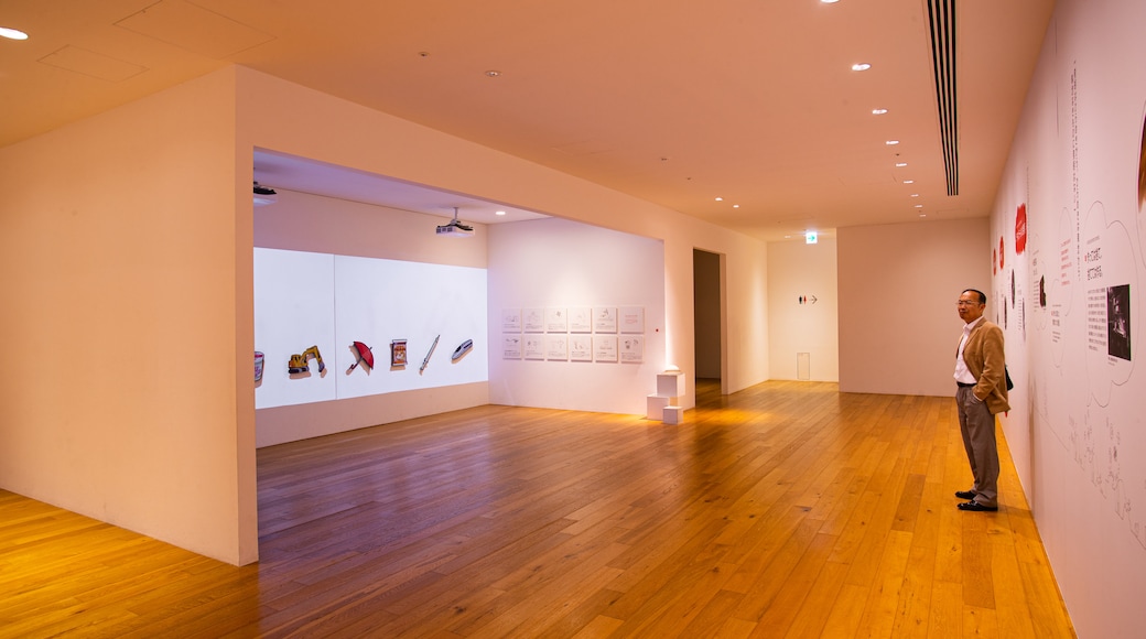 Cupnoodles Museum featuring interior views as well as an individual male