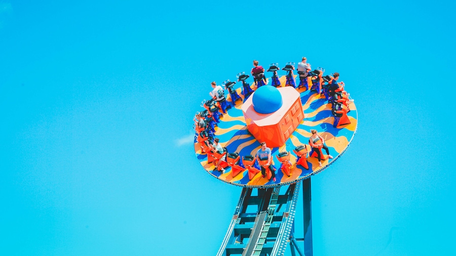 The Park at OWA featuring rides as well as a small group of people