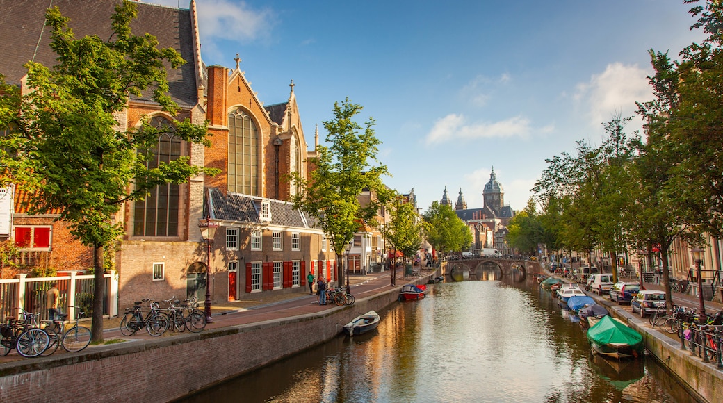 Red Light District featuring a city and a river or creek