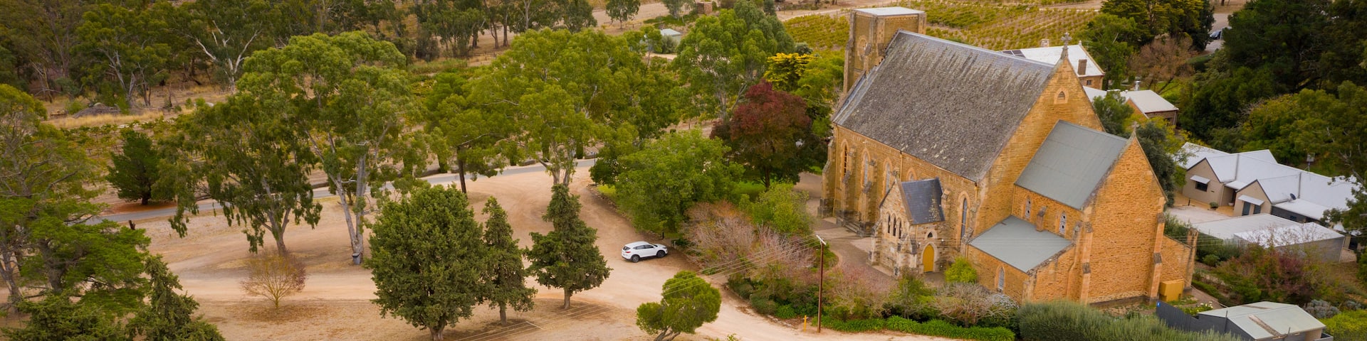 Sevenhill Cellars showing a church or cathedral, landscape views and farmland