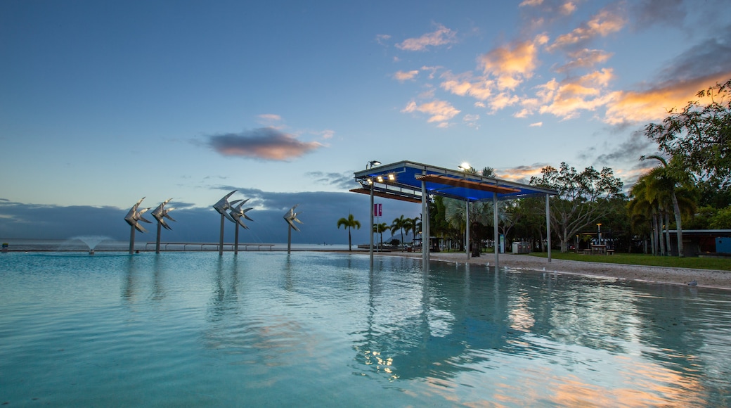 Esplanade Lagoon which includes a pool and a sunset