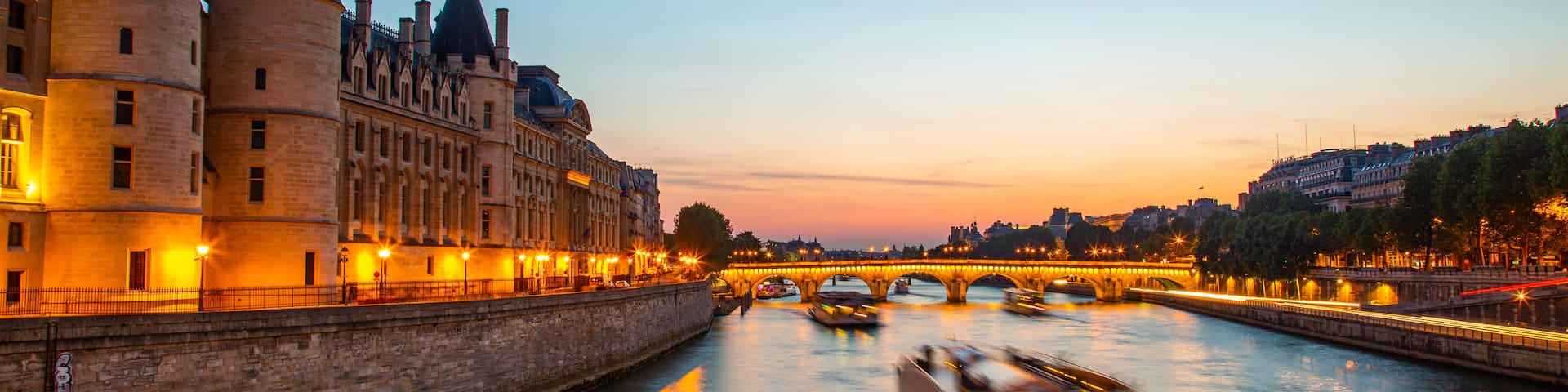 Pont Neuf showing a sunset, a river or creek and night scenes