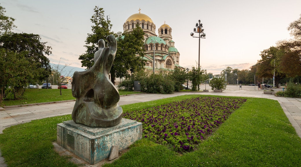 Alexander Nevski Cathedral which includes a sunset, outdoor art and heritage architecture