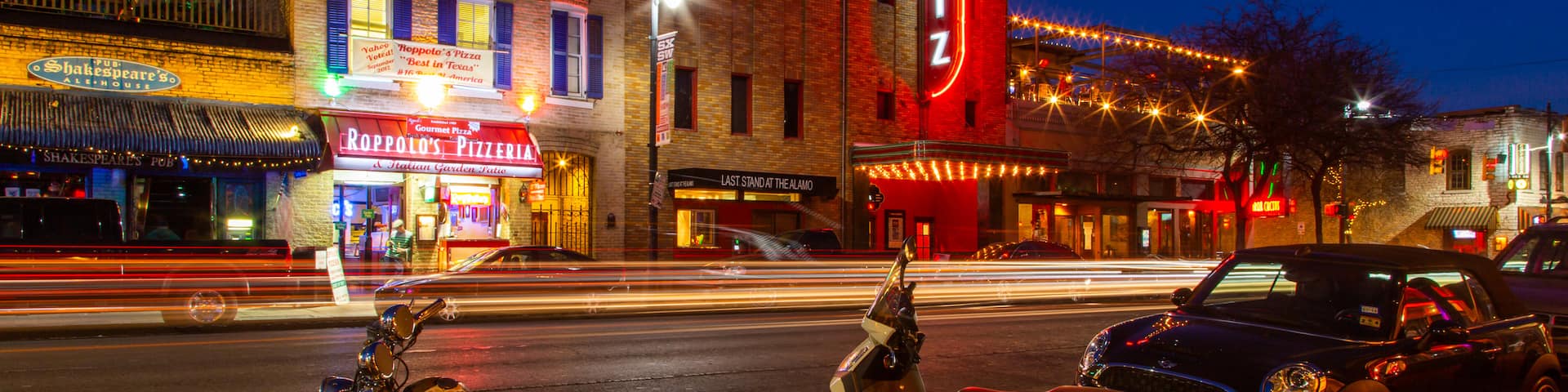 Austin featuring a city, signage and night scenes