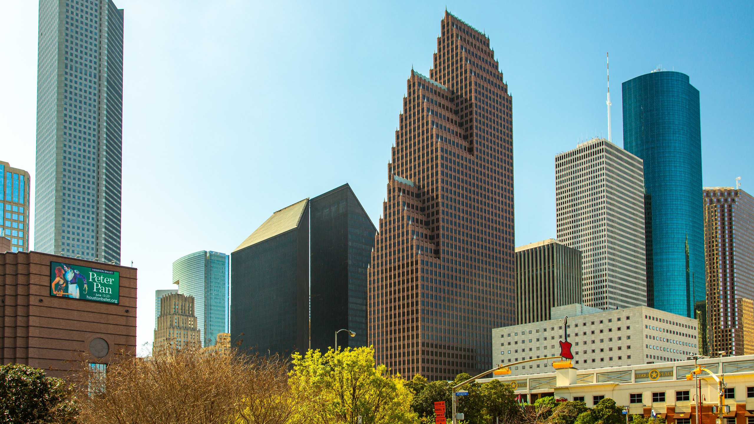 Downtown Houston featuring a skyscraper and a city