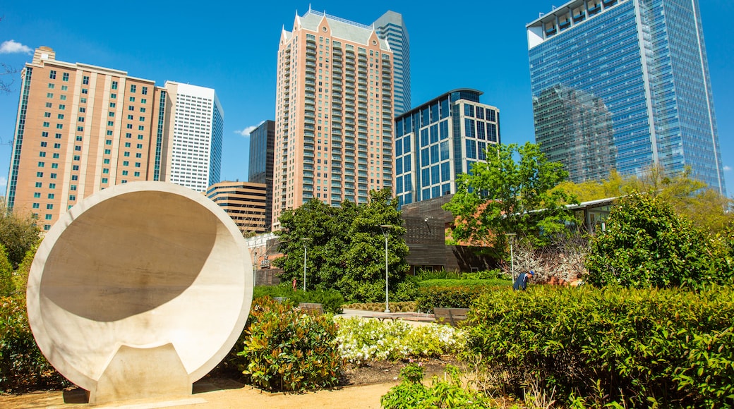 Discovery Green featuring a garden, a city and a skyscraper