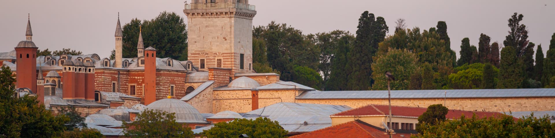 Topkapi Palace featuring a sunset and heritage architecture