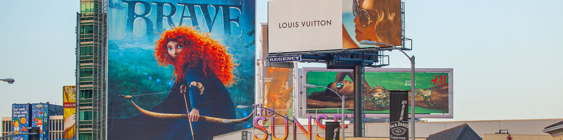 Sunset Strip which includes signage and a city