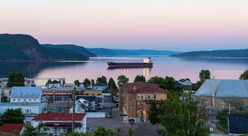 La Baie featuring a sunset, a coastal town and general coastal views