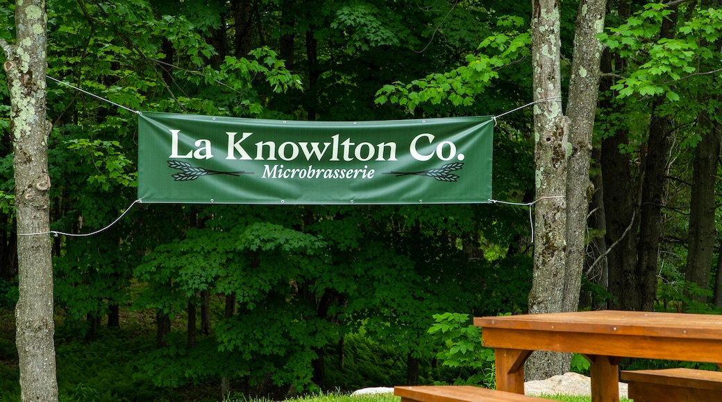 Knowlton which includes signage and a garden