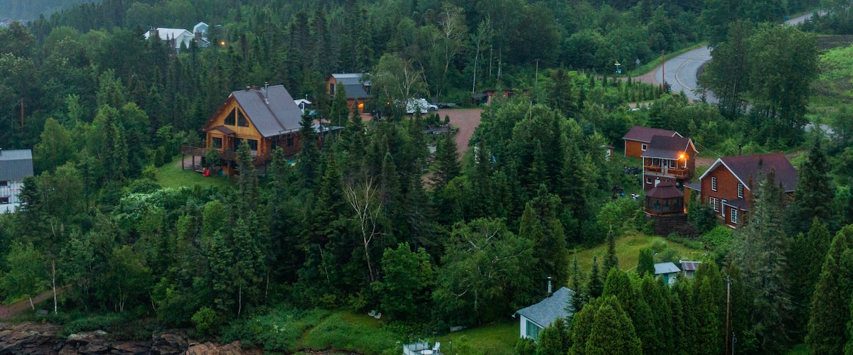 La Baie which includes landscape views, forests and a small town or village