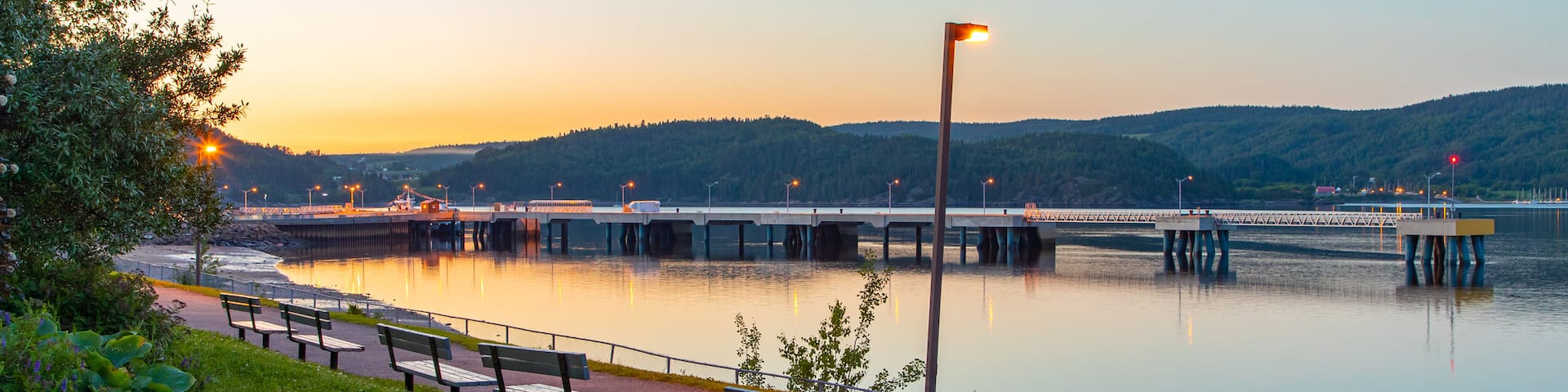 La Baie which includes a garden, a river or creek and a sunset