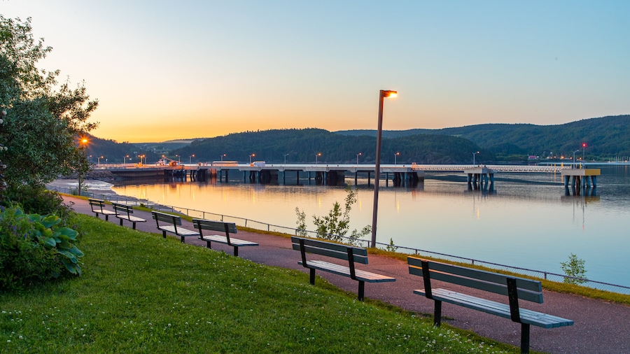 La Baie which includes a garden, a river or creek and a sunset