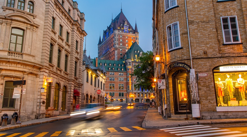 Le Château Frontenac which includes night scenes and a city