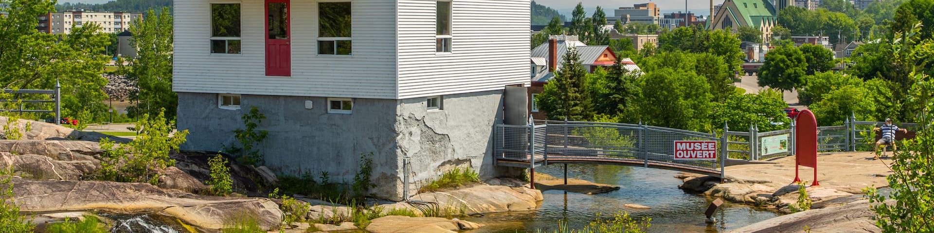 Petite Maison Blanche Museum showing a small town or village and a river or creek