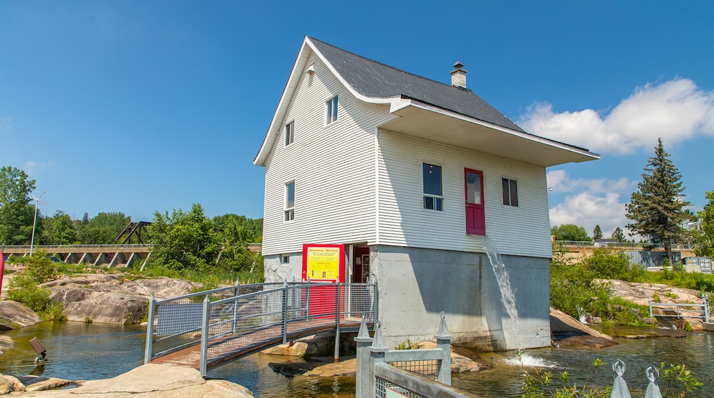 Petite Maison Blanche Museum showing a river or creek