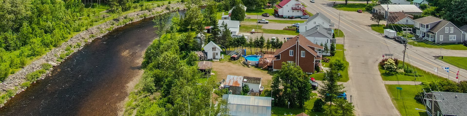 Petit-Saguenay featuring a small town or village, landscape views and a river or creek