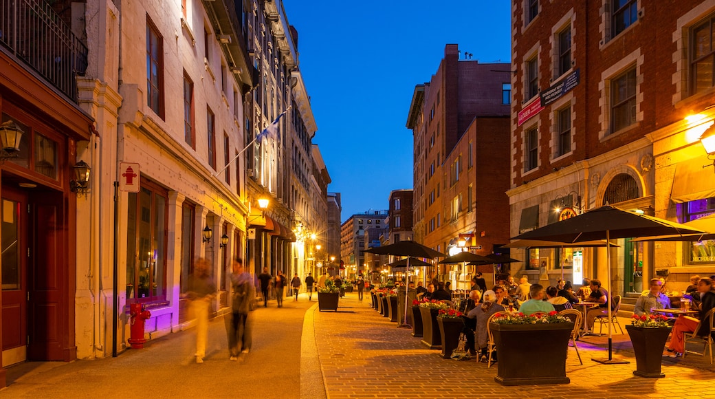 Rue St-Paul which includes night scenes, outdoor eating and a city