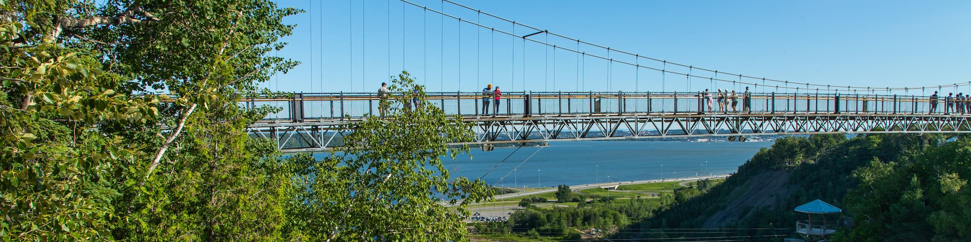 Montmorency Falls featuring a bridge and general coastal views
