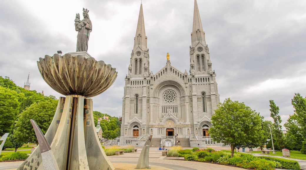 Basilica of Sainte-Anne-de-Beaupré featuring heritage architecture, a church or cathedral and heritage elements