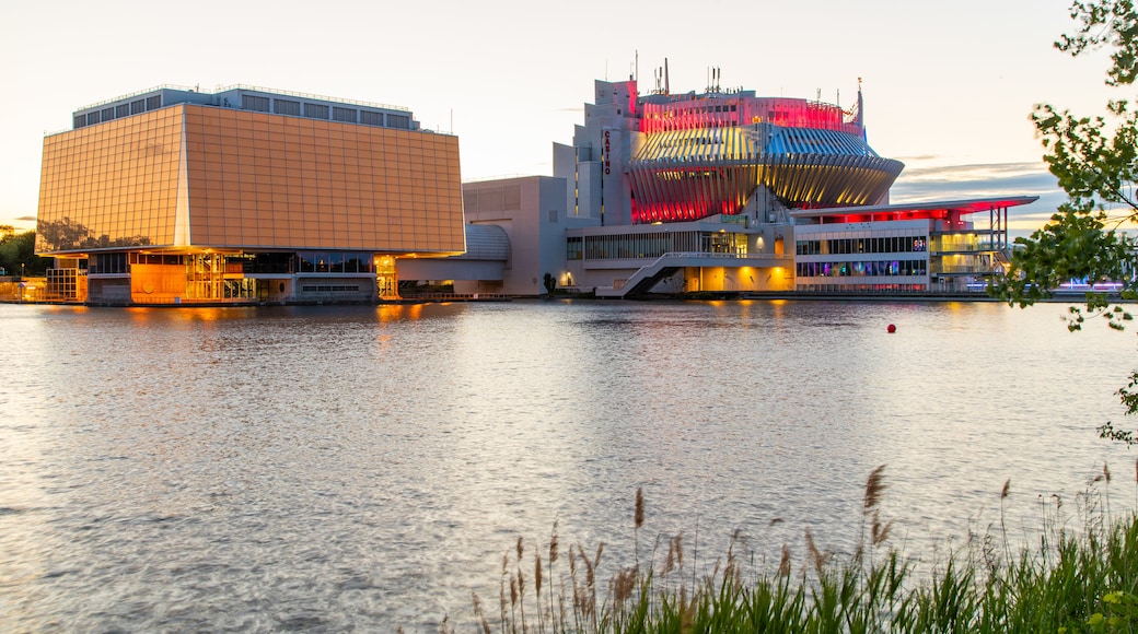 Montreal Casino featuring a lake or waterhole and modern architecture