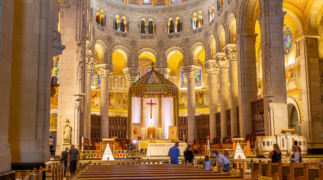 Basilica of Sainte-Anne-de-Beaupré showing heritage elements, a church or cathedral and interior views