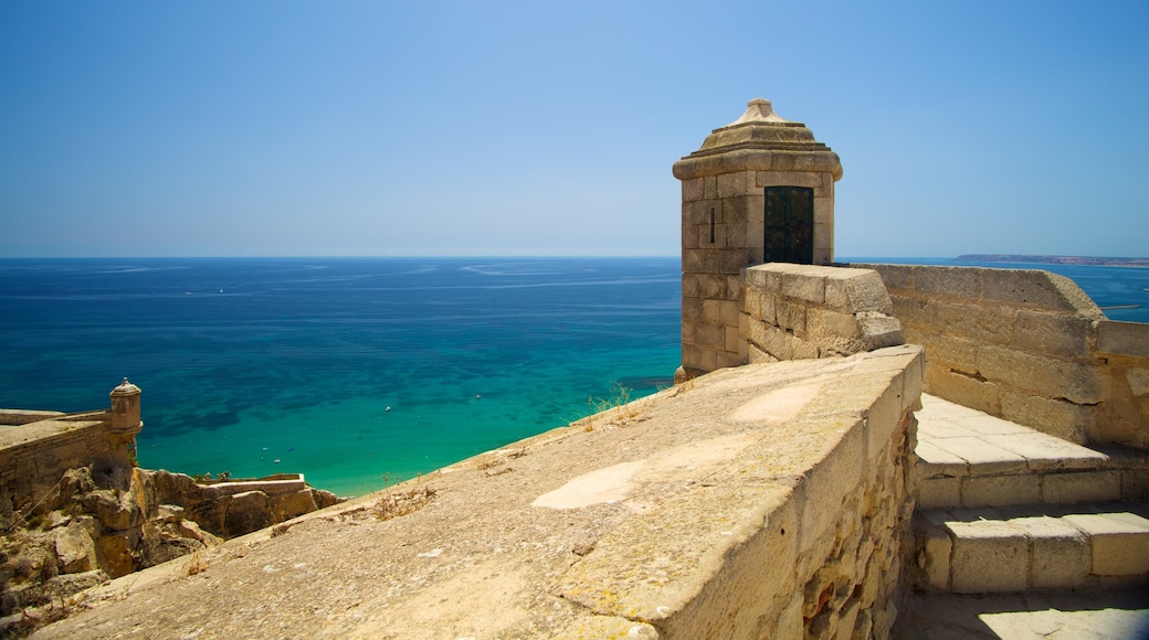 Castle of Santa Barbara which includes general coastal views, château or palace and heritage elements