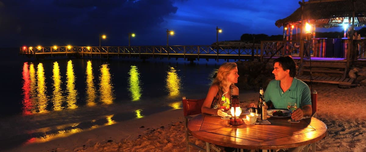 Willemstad featuring a beach, night scenes and views