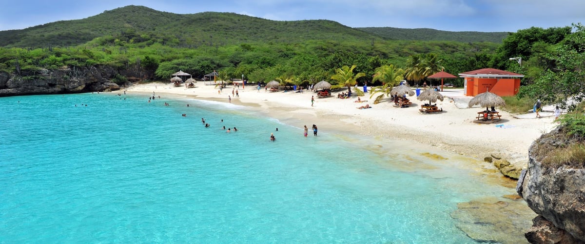 Willemstad showing swimming, rugged coastline and a sandy beach