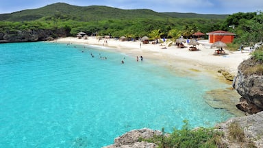 Willemstad featuring rugged coastline, a sandy beach and swimming