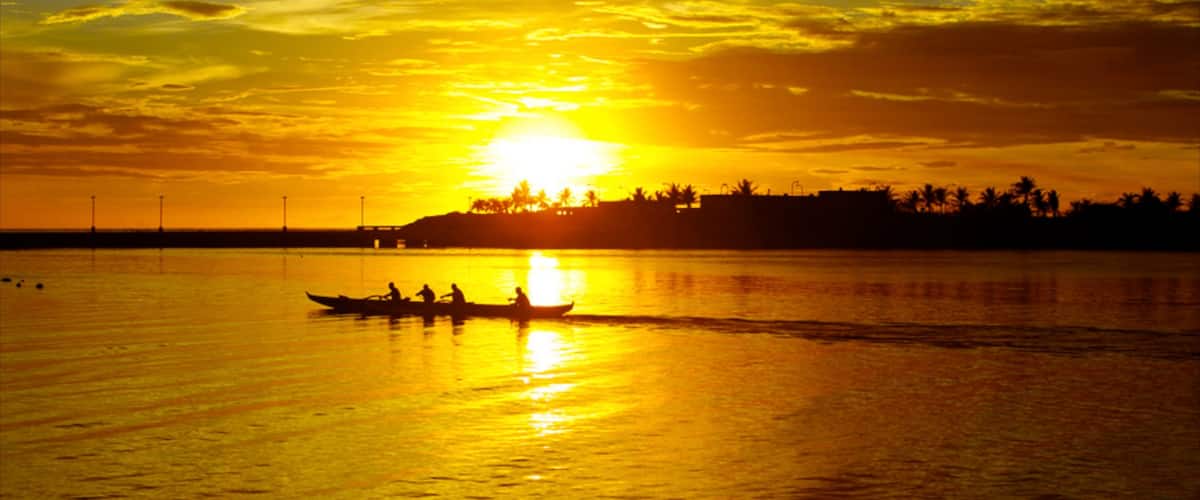 Guam showing kayaking or canoeing, general coastal views and a sunset
