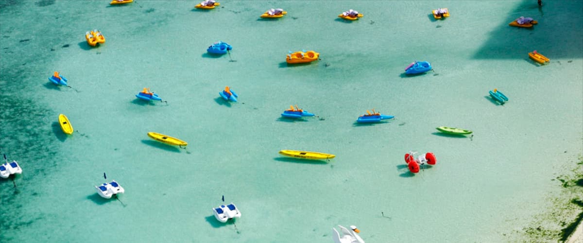 Tumon Beach which includes tropical scenes and a sandy beach