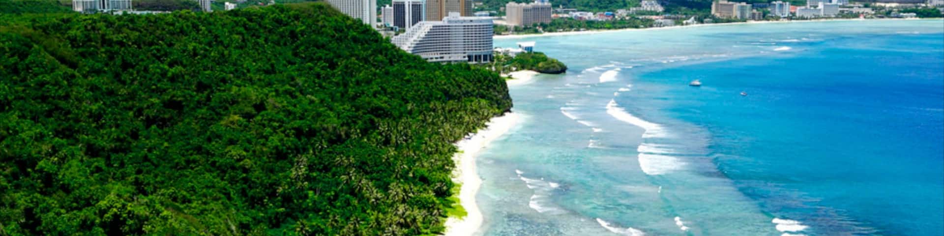 Tumon Beach featuring landscape views, a beach and tropical scenes