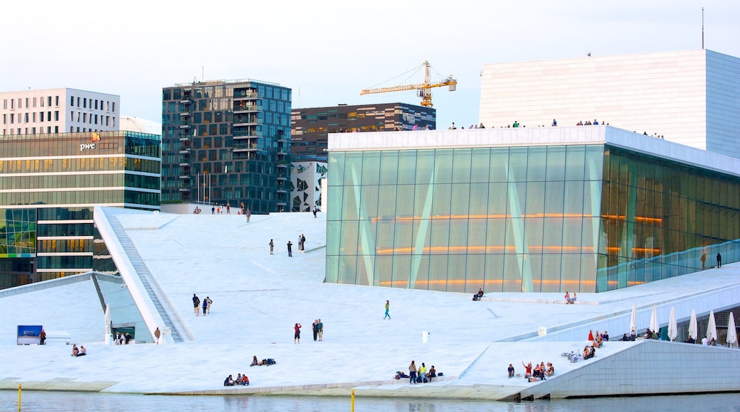 Oslo Opera House showing theatre scenes, a city and modern architecture