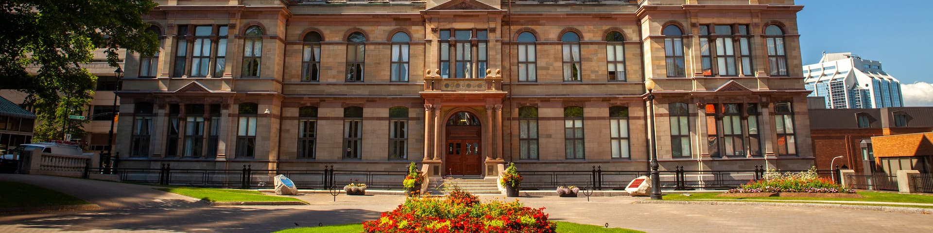 Halifax City Hall showing flowers and heritage architecture