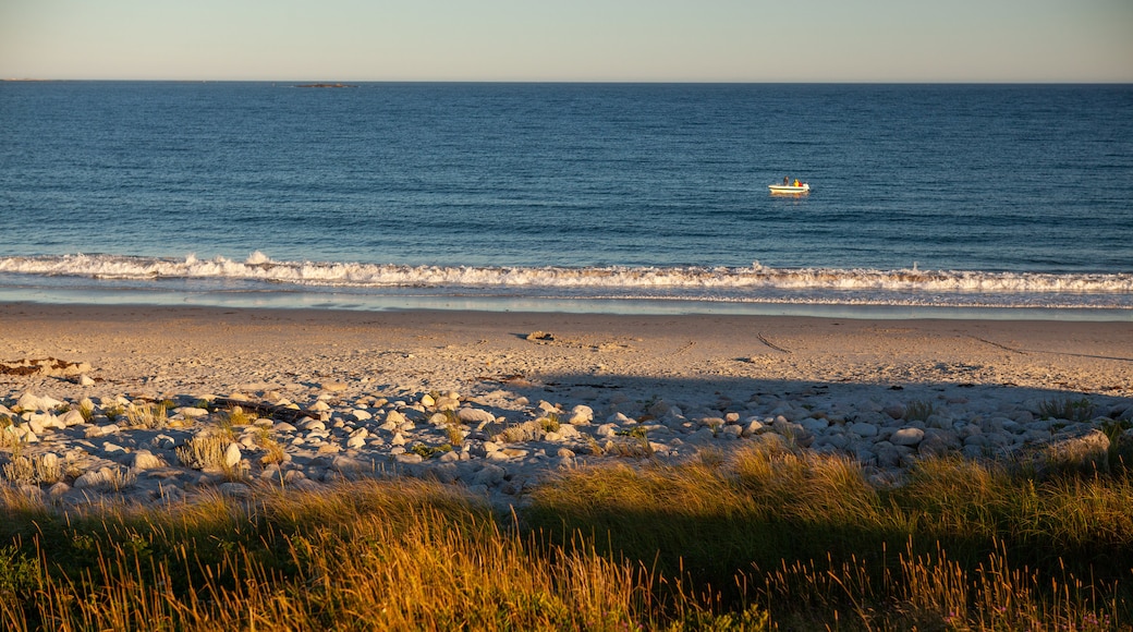 Crystal Crescent Beach which includes general coastal views, a sunset and a sandy beach