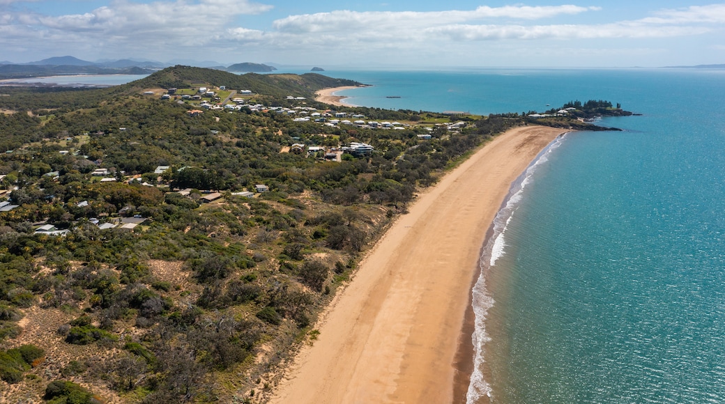 Emu Park Main Beach showing general coastal views, a beach and a coastal town