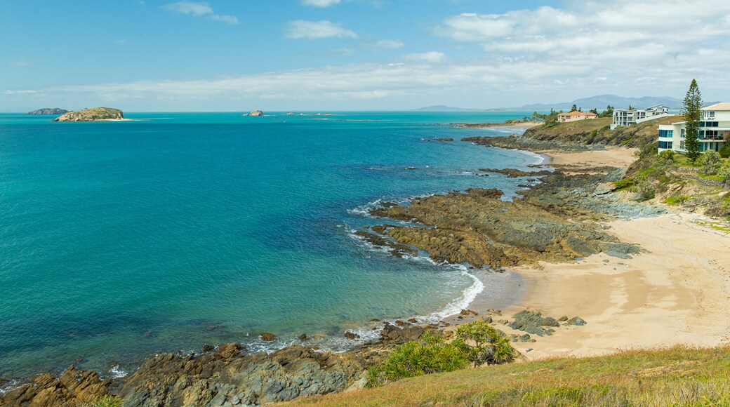 Emu Park showing landscape views, a beach and rocky coastline