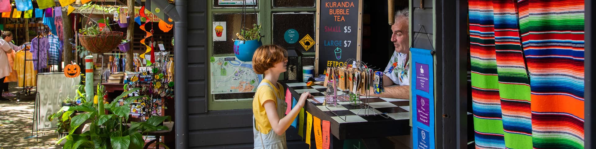 Kuranda Original Rainforest Markets as well as an individual child