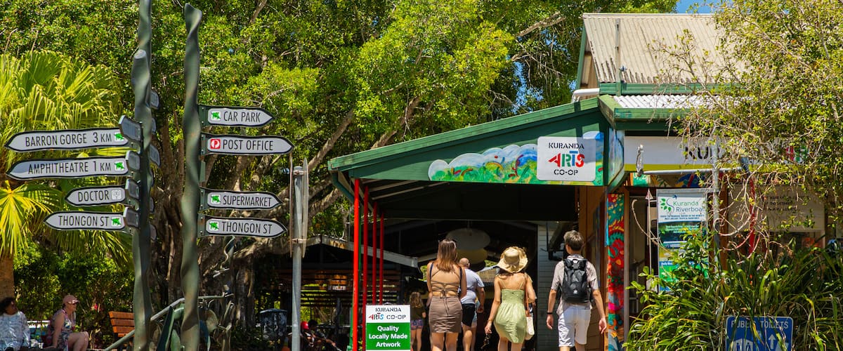 Kuranda featuring street scenes as well as a small group of people