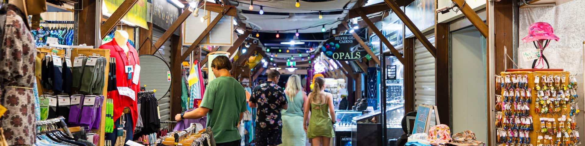 Cairns Night Markets showing markets as well as a small group of people