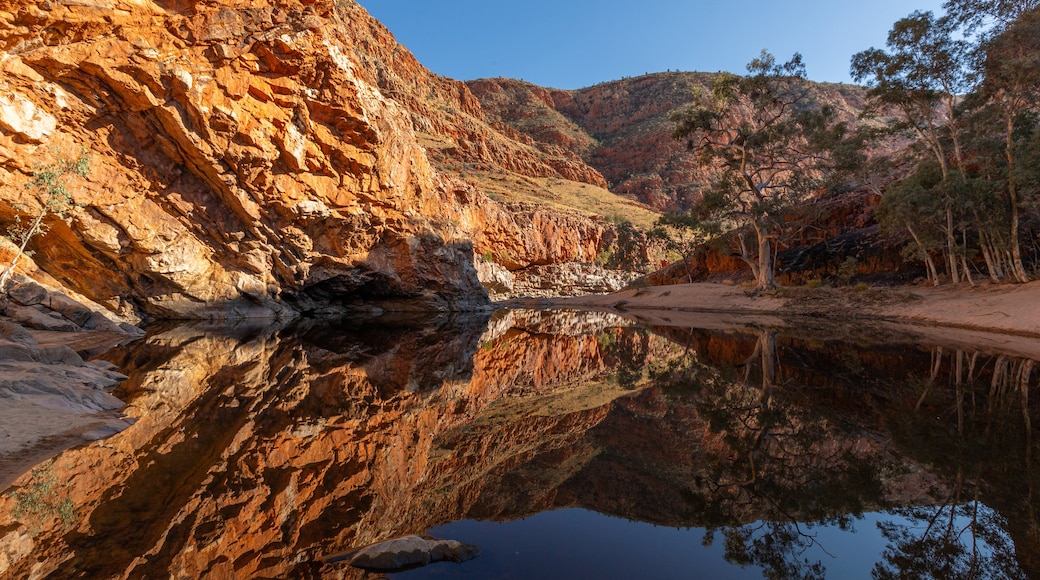 Ormiston Gorge showing a pond and a gorge or canyon