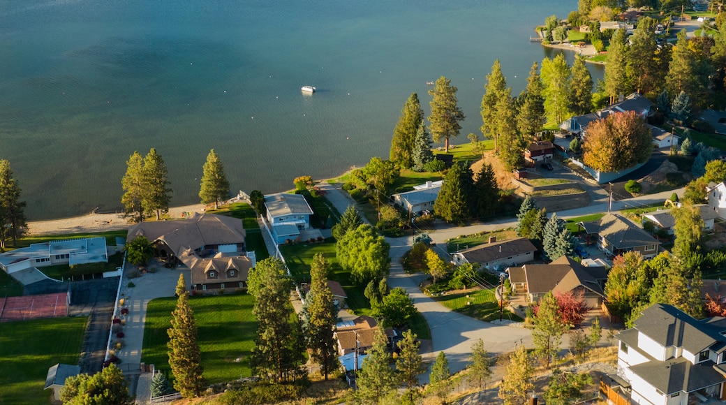 Skaha Lake featuring a small town or village and a lake or waterhole