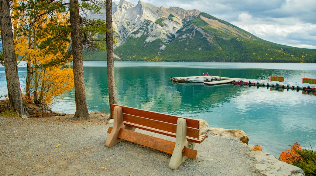 Lake Minnewanka featuring a lake or waterhole and mountains